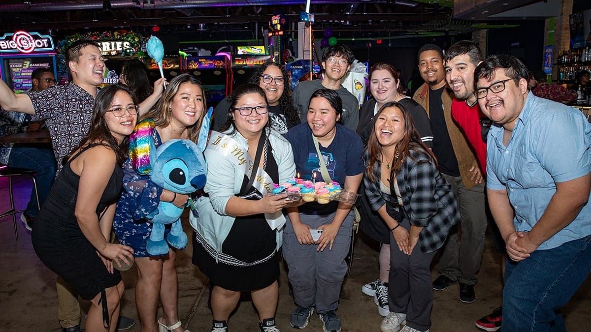 Adult social group celebrating at Ignite Arcade.